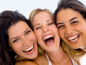 Patients smiling after Invisalign treatments in Aliso Viejo, CA