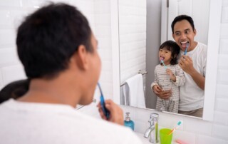 Dad and Daughter dental care