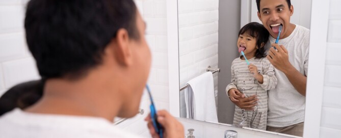 Dad and Daughter dental care