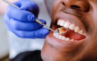 Man’s Teeth Being Examined