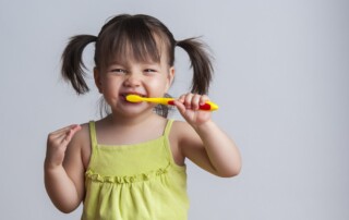 Little Girl Brushing Teeth